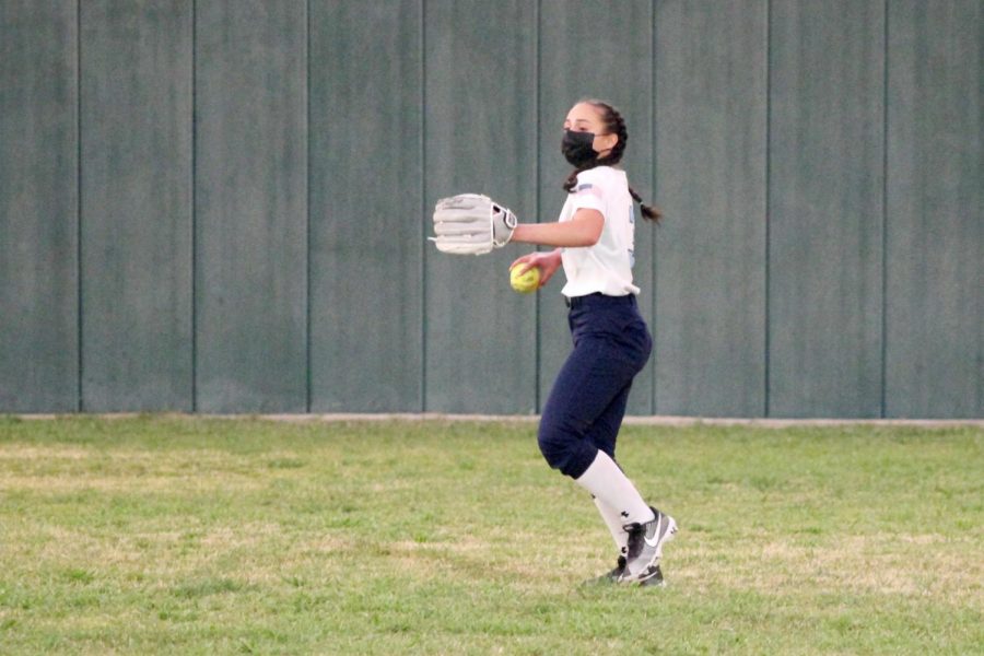 Playing left field, Alanis throws the ball to shortstop. The game was against Canitillo, and was the teams first of the season.