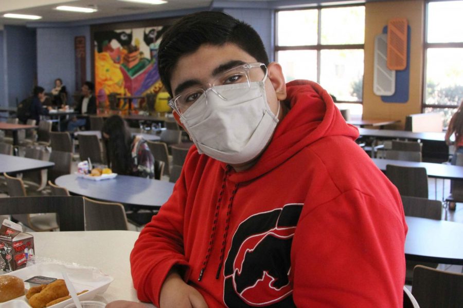 I wear a mask because, my mom told me that I should never keep my guard down and take off my mask because, even if youre in class, you should wear one, junior Maximiliano Herrera said on why he wears a mask.