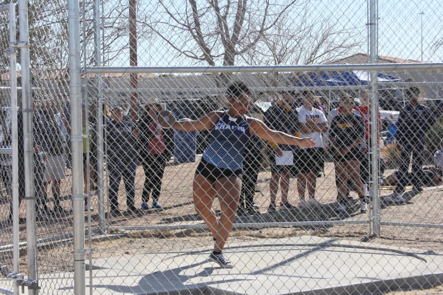 ______ giving her all in Open(?) Girls Shot Put.