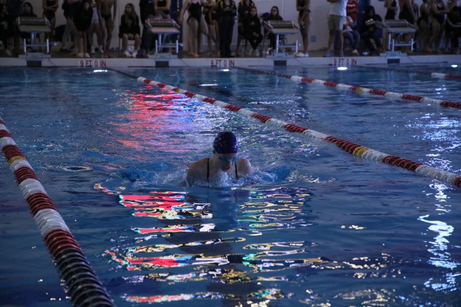 Sarren Hines senior swimming the medley relay.