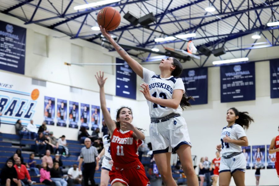 Senior Natalie Mesa goes up for the layup against Jefferson.