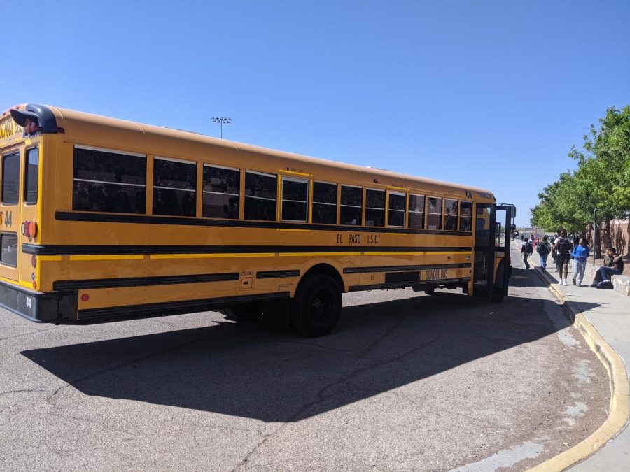 Buses wait at the location behind the gym where drivers drop off and pick up students. On occasions, students going to school and from school have to wait longer for their bus due to the extended routes that their driver took prior or for a substitute driver.