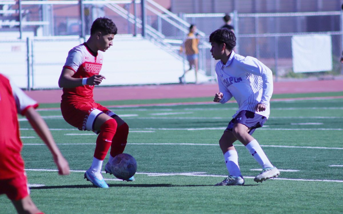 Angel Suarez, fighting for the ball with an attacker from the Silver Foxes. Angels persistence on the play led the huskies to the first goal of the game.