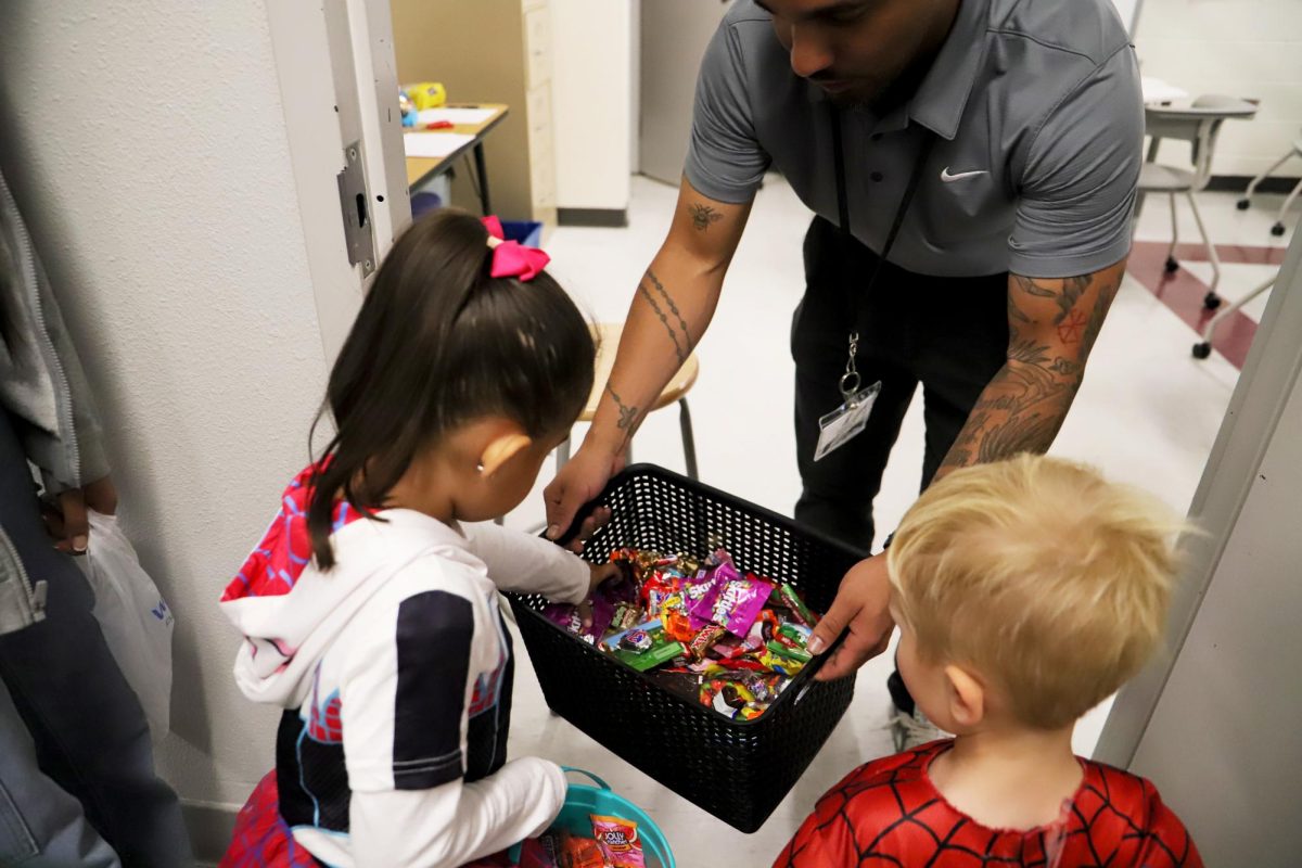 With a playful grin and a bowl overflowing with sweets. Mr Crank was trying to get rid of all the candy he bought he told the kids."Take as many candy as you want".