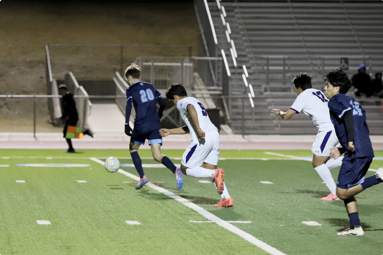 Olivia Zimmer
Cross it.
Senior Logan Zimmer gets the ball again in the other teams defense. He dribbled past some of the defense trying to cross it into the box to help his team get a point. Logan said "my performance was good as always it could have been better but I can’t complain on my overall performance," said Logan he made some good passes into the box and passes out side of the box that lead to shots on Franklins goal.