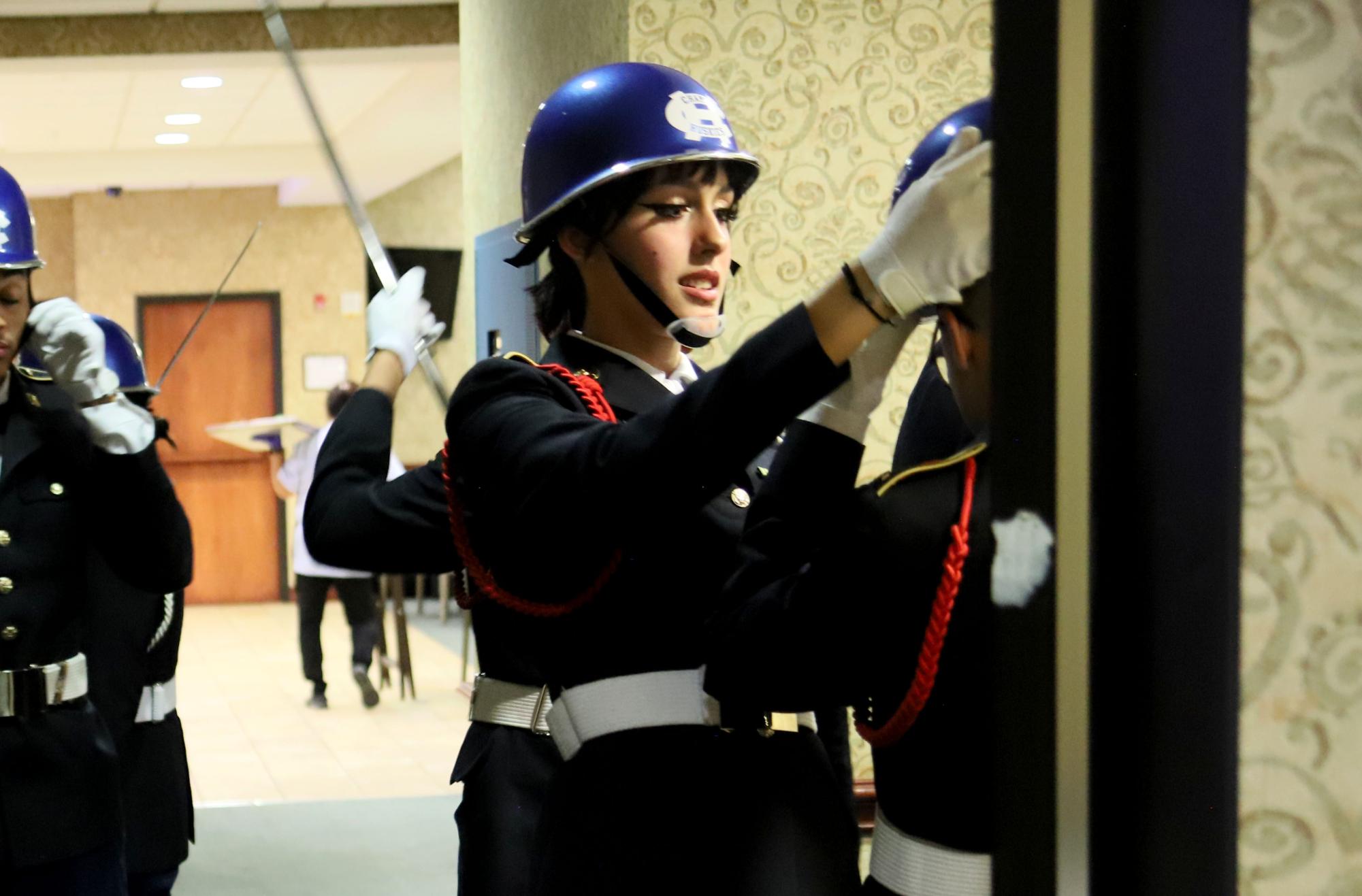 The sword cordons were setting up to hold the swords for senior JROTC students, as a way to farewell and wish them luck in their future. 
