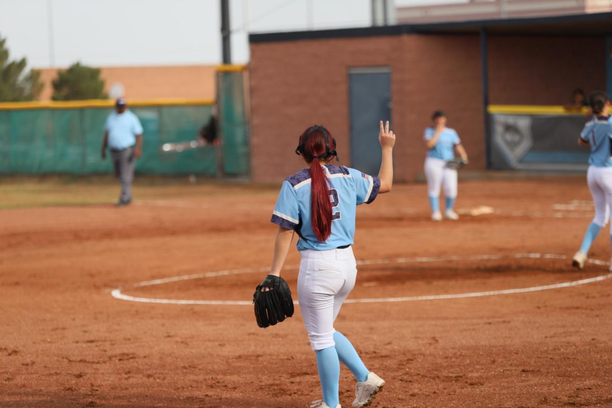 Player at third signals to first that they are two strikes in