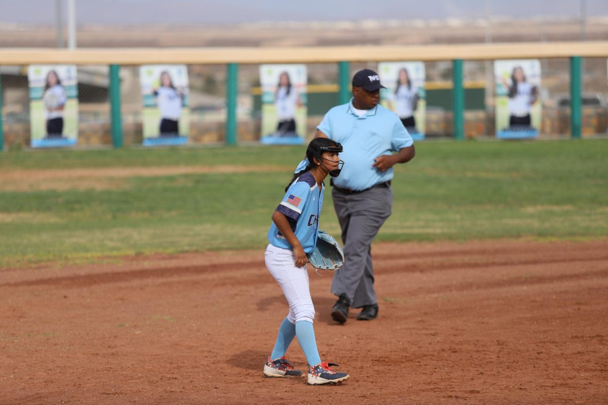 Players awaits the ball of the opposing teams batter
