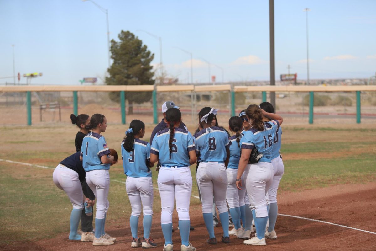 All players on the field huddle up to discuss their next play