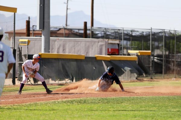 Freshman Hector Sifuentes makes a run from second to third attempting the steal third. He slid into the base and stayed safe, late in the play he made it home to get a run for his team.