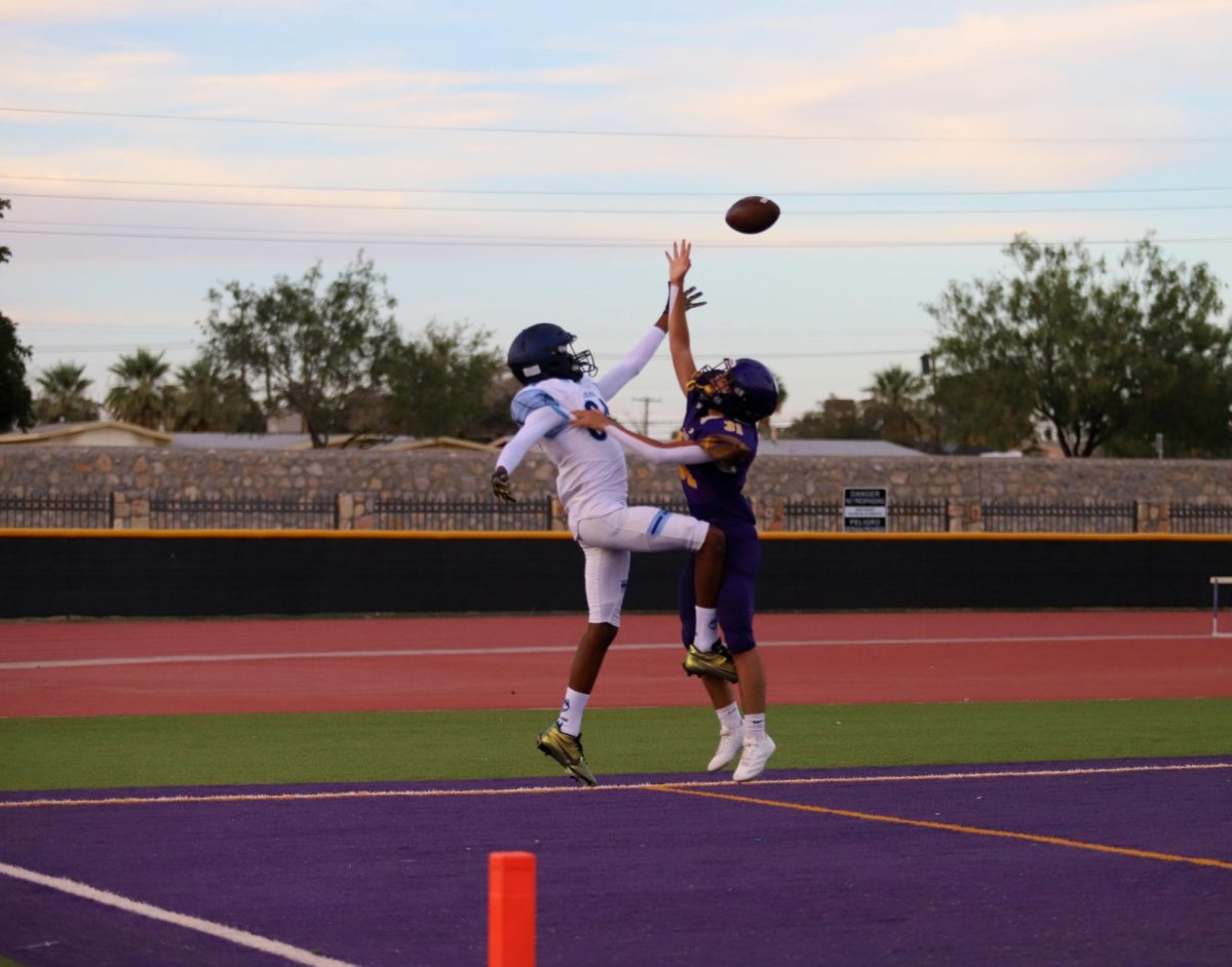 So Close! Freshman Trason reaching for the ball trying to make a touchdown.