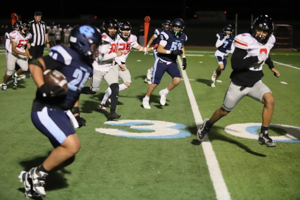 Adahn with a big run against hanks high school, sophmore Adahn says"I just saw the open lane and went for it no hesitation"
