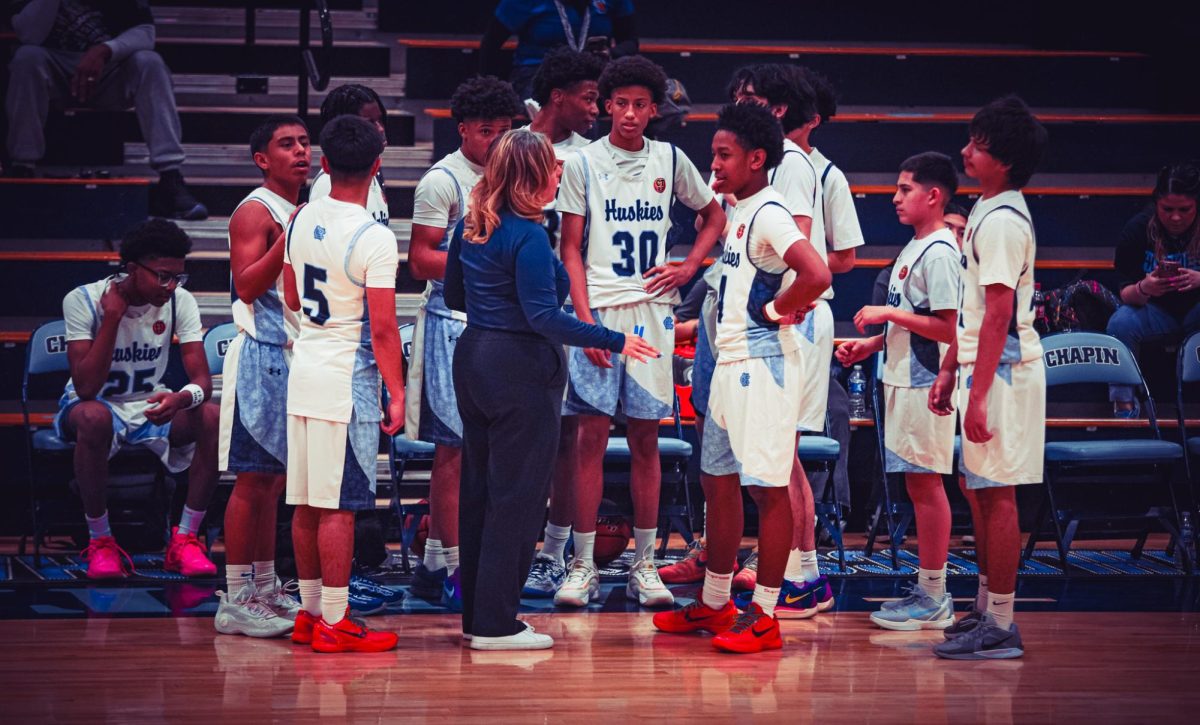 Coach Martin talking to her team before the game.