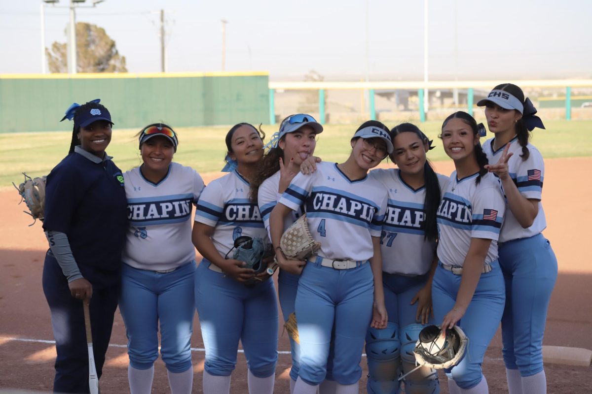 Team. In this photo some of the varsity softball is seen. After this photo was taken they went on to destroy Andres 15-0. "When you are on a team everybody needs to be on the same page or things will go wrong" Fan Mike Chavez stated.