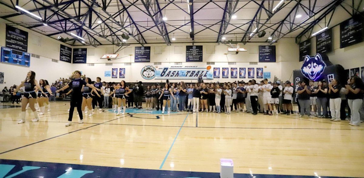 Ending the night. All teams stand on the court as the dance team and band deliver the final performance. The event ended with athletes and coaches recognized.